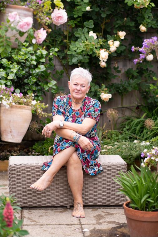 Jules Whale sat in the garden