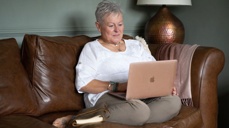 Jules on the sofa working