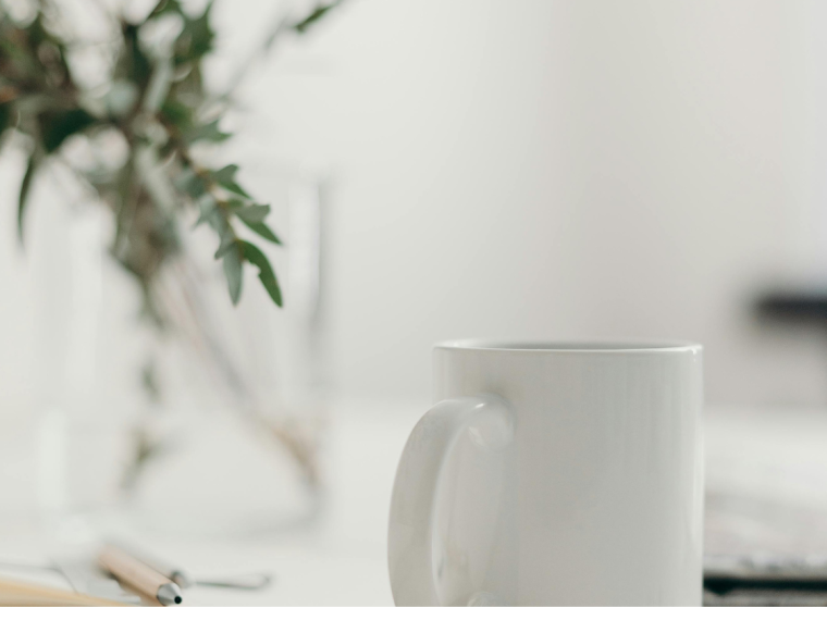 White coffee cup on table